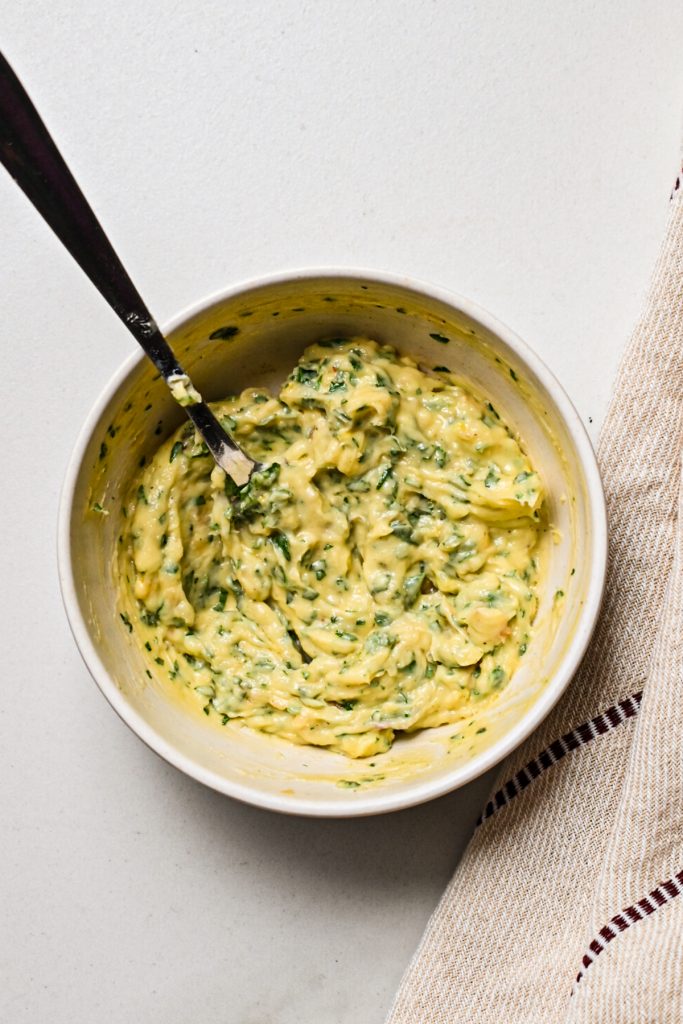 Compound garlic butter in a small bowl.