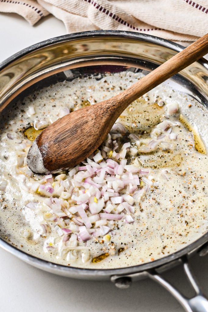 Butter and pepper in a pan with diced shallot.