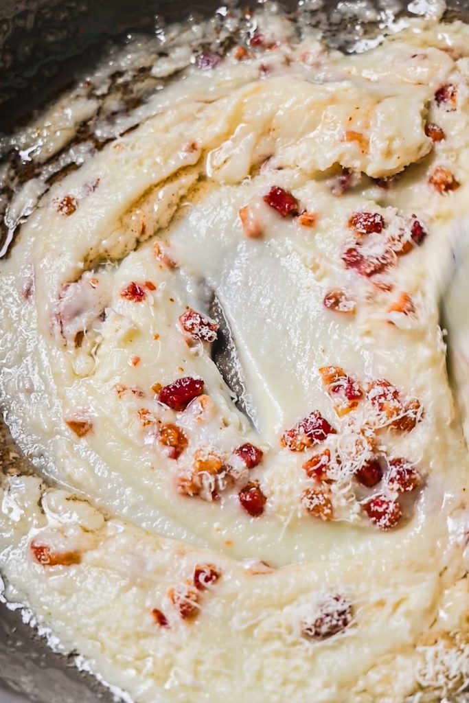 Pancetta mixed with creamy cauliflower mixture.
